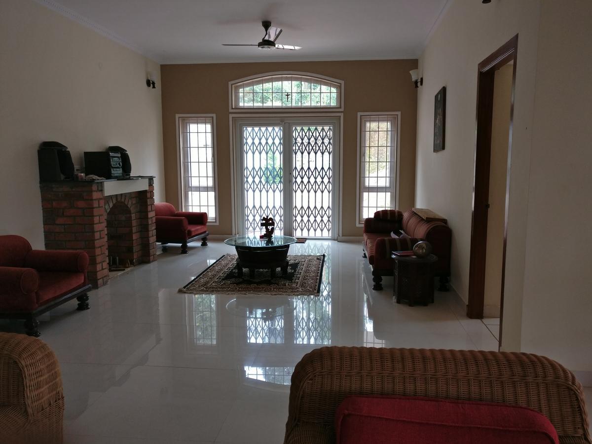 Robin Woods Homestay Саклешпур Екстериор снимка